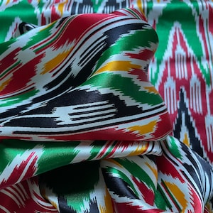 Vintage crepe atlas in green-red with spots of yellow, black and white
