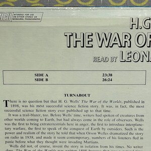 May include: A vintage record album cover featuring a black and white image of H.G. Wells. The album title is "The War of the Worlds" and the text "Read by Leonard" is printed below. The album cover also includes the side A and side B track times.