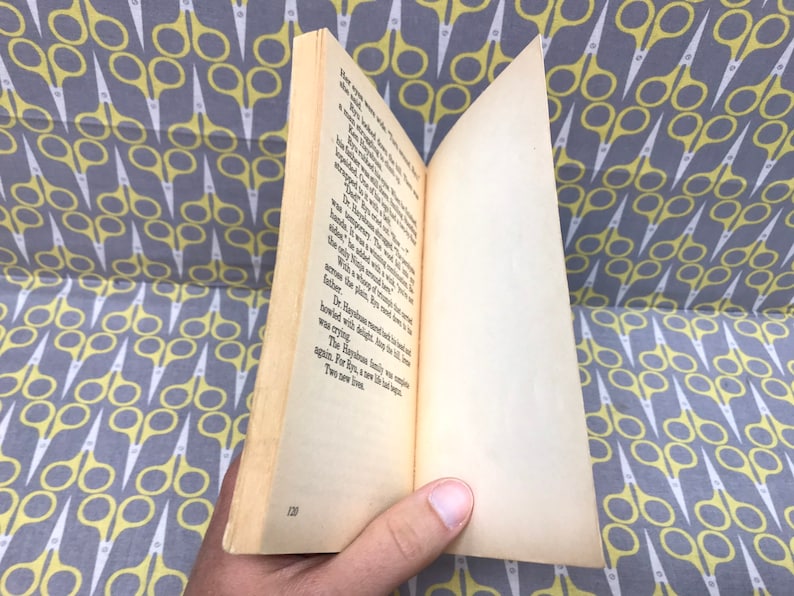 May include: An open book with a white background and text printed in black. The book is open to page 120.