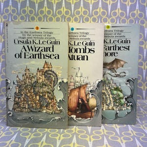 The Earthsea Trilogy by Ursula K Le Guin paperback book A Wizard of Earthsea The Tombs of Atuan The Farthest Shore