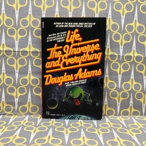 Life The Universe and Everything by Douglas Adams paperback book Hitchhiker Trilogy
