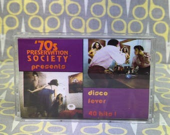 May include: A vintage cassette tape case with a purple and orange cover. The cover reads "'70s Preservation Society Presents" and "disco fever 40 hits!". The case contains images of people in 1970s attire.