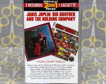 May include: A clear plastic cassette case containing a Janis Joplin and Big Brother and the Holding Company album. The cover features the text 2 ON 1, PEARL, and CHEAP THRILLS, along with a tracklist including Move Over and Ball and Chain.