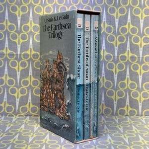 The Earthsea Trilogy by Ursula K. Le Guin paperback book A Wizard of Earthsea The Tombs of Atuan The Farthest Shore