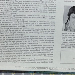 May include: A black and white photo of a man with short, dark hair and a smile. The man is wearing a light-colored shirt. The text "Fiddler on the Roof, Fagin in Oliver! Cuckoo's Nest and Sherlock Holmes in creative outlets aside from acting and black-and-white studies have been shown. I and Will I Think of You have been produced. Other Caedmon titles read by Leon..." is visible in the image.