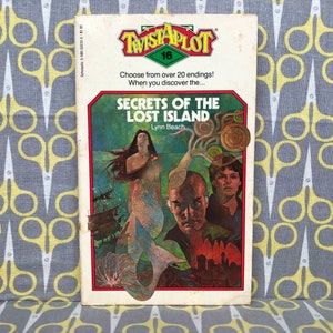 May include: A book cover for a "Twistaplot" book titled "Secrets of the Lost Island" by Lynn Beach. The cover features a mermaid, a man, and a woman. The book is number 16 in the series.