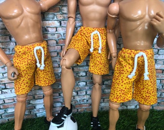 Pantalones cortos amarillo naranja para hombre de acción y amigos