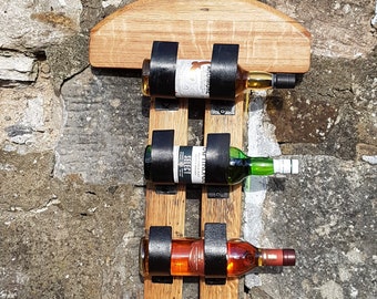 Bottle storage and shelf made from recycled whisky barrel