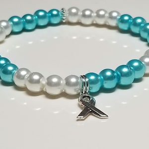 Zervikal Cancer Awareness Stretch Armband / Türkis und Weiß Awareness Band Schmuck / Zervix Krebs Armband zur Unterstützung