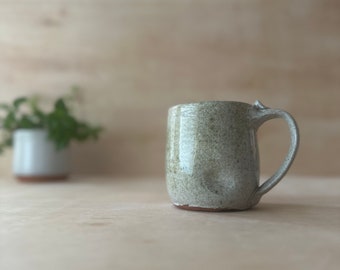 Handmade ceramic 12oz mug, white speckle glaze, green accents, simple and beautiful handmade mug