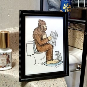 Framed print. Bigfoot Bathroom Buddies. Part two, Nature Calls. 5x7 inch. Bathroom art. Bigfoot on the Toilet. Bigfoot art. Sasquatch. image 1