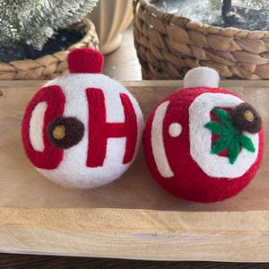 The Ohio University OH-IO set. Red and white ornaments with buckeye leaf.