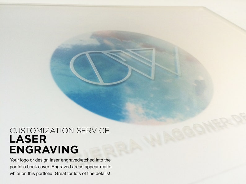 May include: A white background with the text "CUSTOMIZATION SERVICE LASER ENGRAVING" and the text "ERRA WAGGONER DESIGN" in a circle with a blue and white cloudy background. The text "Your logo or design laser engraved/etched into the portfolio book cover. Engraved areas appear matte white on this portfolio. Great for lots of fine details!" is also included.