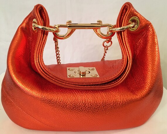 burnt orange clutch bag