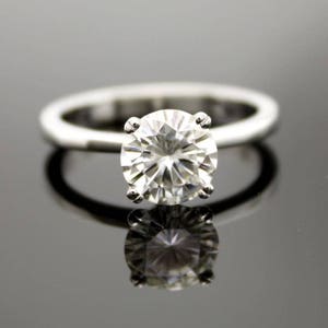 Beautiful Custom Made Solitaire Engagement Ring 1.25 Carat Stunning 7mm Round Brilliant Moissanite Jewel 14 karat Rose, White or Yellow Gold