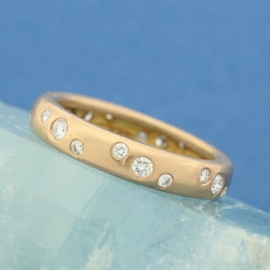 18 Karat Rose Gold Ladies Brilliant Round Cut Natural Diamond Eternity Band, Bezel Set With 0.65 Carat Fine Bright White Diamonds, Size 6