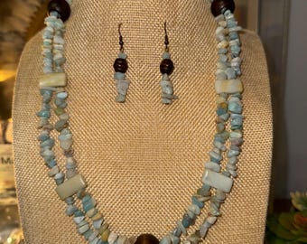 Conjunto de colar e brincos inspirado na costa de Brisbane