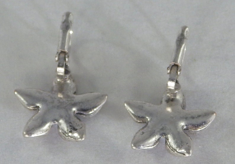 Blue Center Silver Tone Flower Earrings