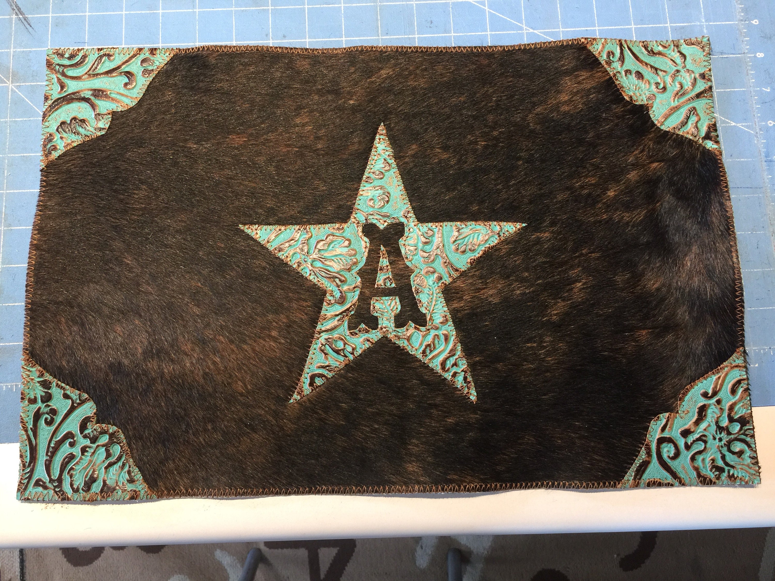 Custom Made Cowhide and Leather Place Mats