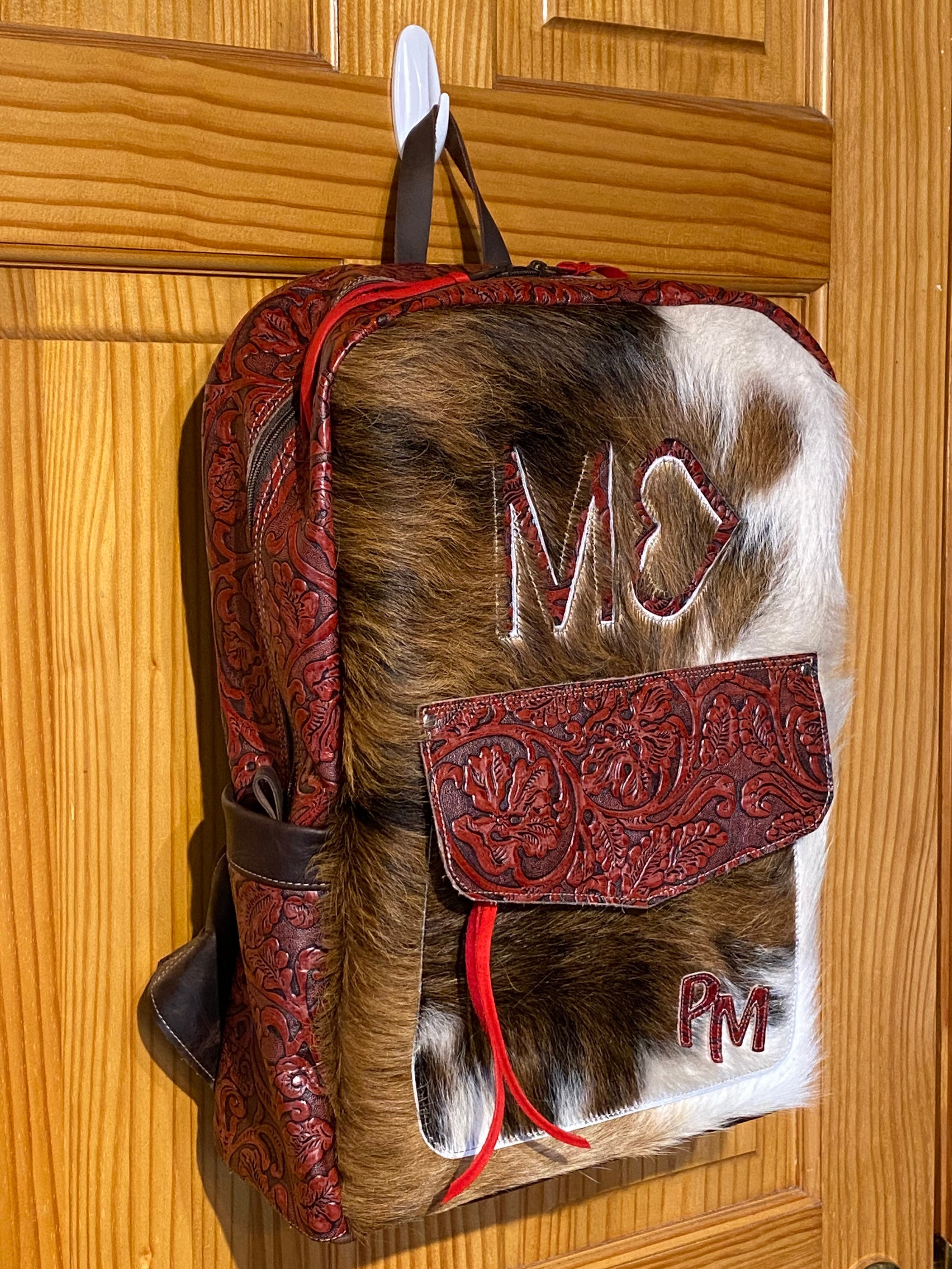cowhide backpack purses