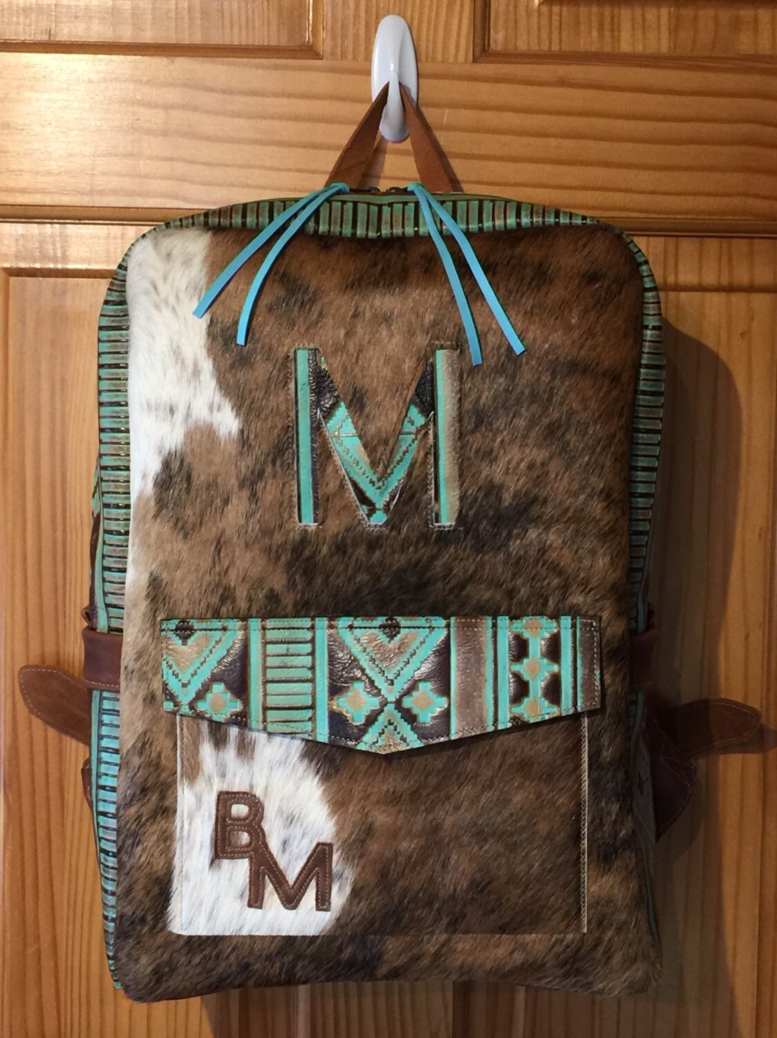 cowhide backpack purses