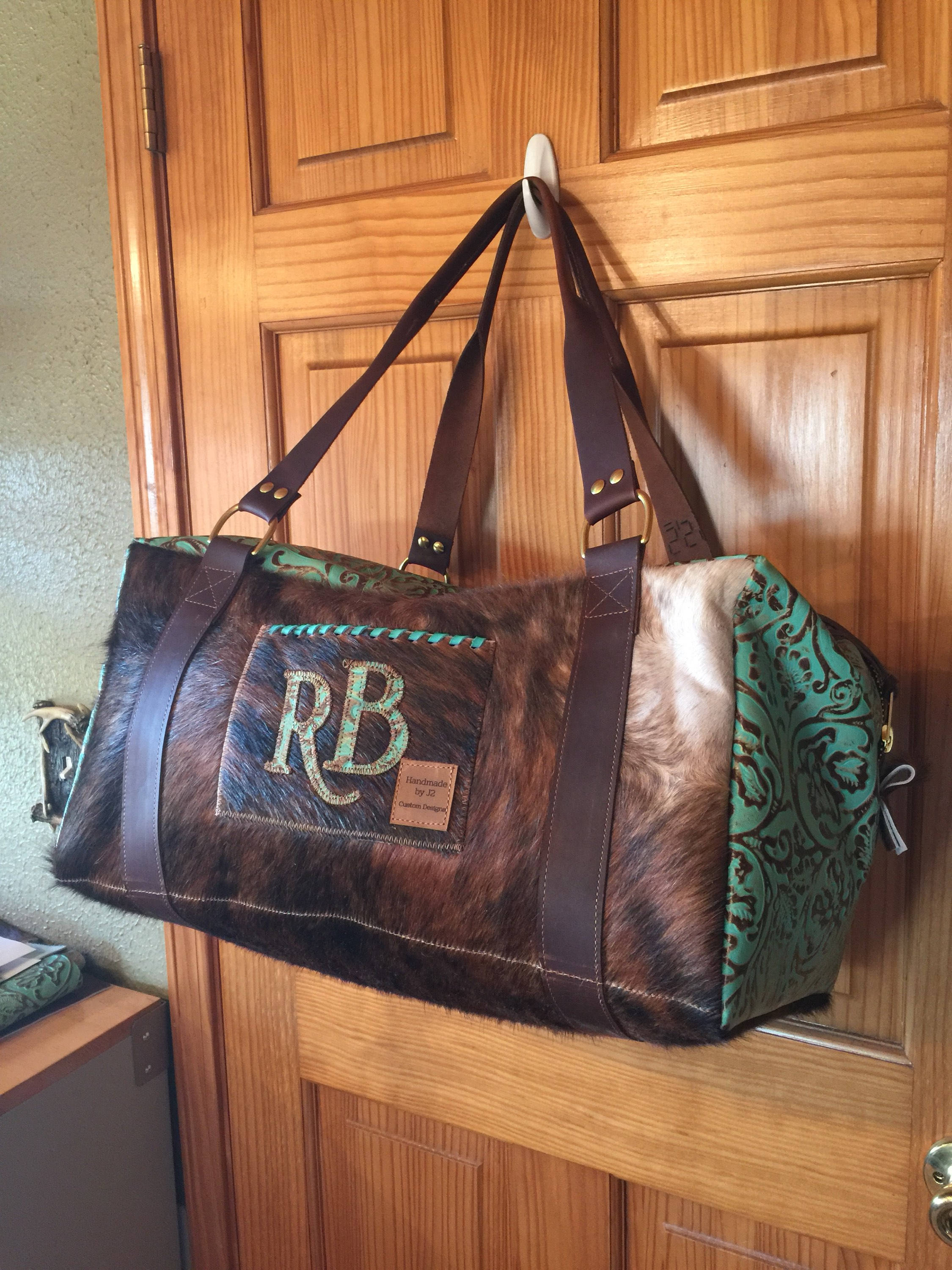 HC Repurposed LV Cowhide Duffle Bag – Shop Hannah Closet