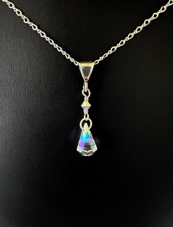 Hanging crystal necklace discount