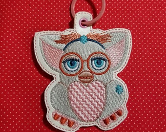 Ms. Furball fobs ITH embroidery design.  4x4 and 5x7