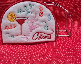 Cheers Napkin Holder Cover embroidery design.  5x7 in the hoop design