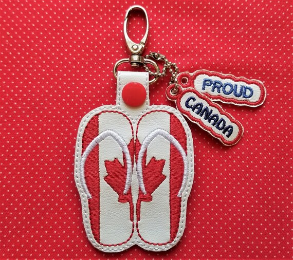 Canada Patriotic flip flops ITH embroidery design.  Charm and 2 fobs included.