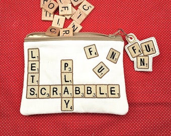 Word Tiles zip bag with charm embroidery designs.   5x6-1/2" and 6x9" 2 sizes