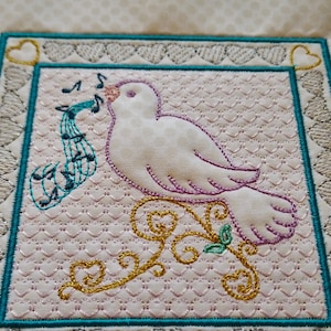 May include: A white dove with pink accents sings a song of musical notes on a white background with a gold and teal border. The dove is perched on a gold branch with green leaves.