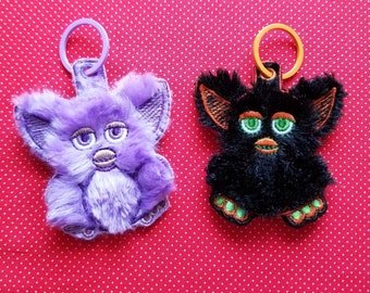 Furball fobs ITH embroidery design.  Fur-fleece-terry cloth-snaptab and fob