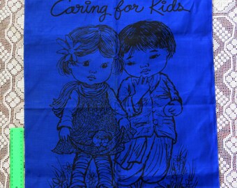 Vintage 70s / 80s Caring For Kids linen orange tea towel - World Vision charity - new!