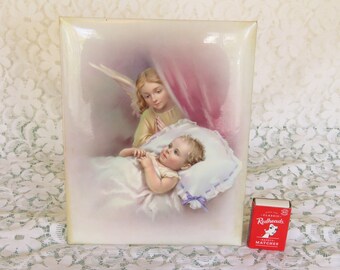 Super sweet 1960s picture of angel watching over baby - glossy picture on metal with plastic stand