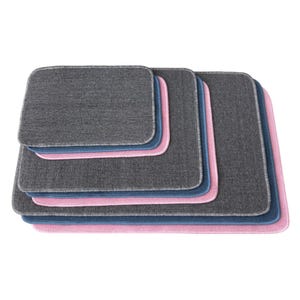 May include: A stack of rectangular gray mats with rounded corners. Each mat has a colored border: pink, blue, and gray. The mats are arranged in descending order by size, with the largest mat at the bottom.