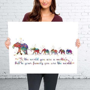 May include: A watercolor painting of a family of elephants with the quote "To the world you are a mother, but to your family you are the world." The elephants are painted in shades of pink, blue, green, yellow, and purple.