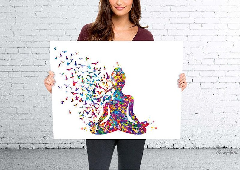 May include: A vibrant watercolour print showing a meditating figure with a bird design. The figure is in a seated yoga pose, with a colourful array of colours. Birds are depicted flying away from the figure's head. The artwork is displayed on a white background.