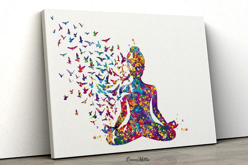 May include: A canvas print features a person in a yoga pose, rendered in a watercolour style. The figure is made up of colourful paint splatters, with a flock of birds flying from the head. The birds are in shades of blue, purple, red, and yellow.