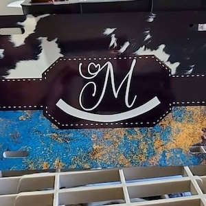 Custom farm brand/name cowhide and turquoise accent license plate