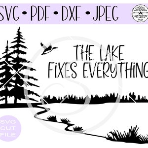 May include: Black and white silhouette design of a lake with trees, a bird flying overhead, and the text "The Lake Fixes Everything".