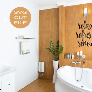 May include: A bathroom with a white bathtub, a white sink, and a wooden wall with the text "relax refresh renew" in black cursive writing.