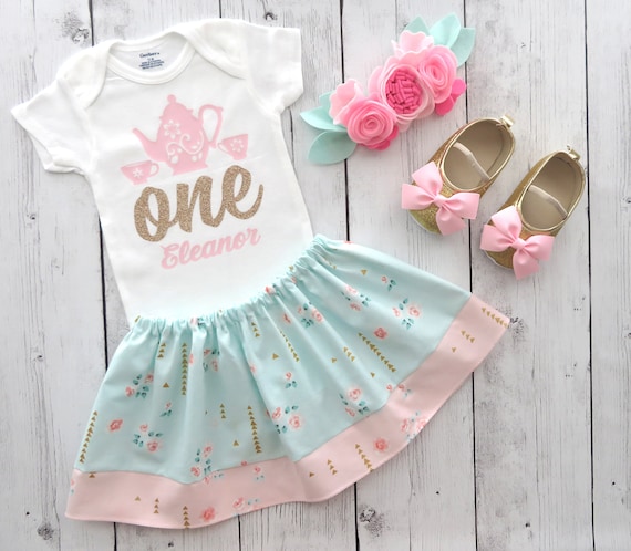 mint and gold outfit