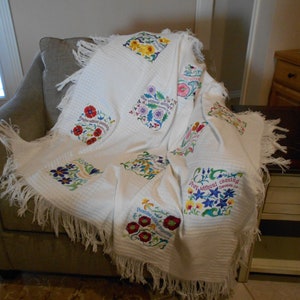 Embroidered lap robe for mom or bride. Designs featuring beautiful floral motif and biblical references. Personalized to make memories.