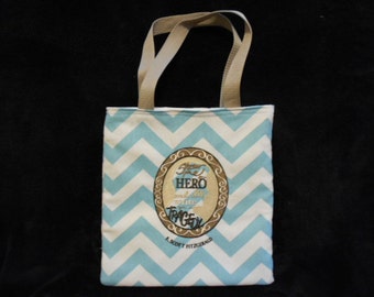 Great Gatsby Tote Bag. F. Scott Fitzgerald's quote, "Show me a HERO and I'll write you a TRAGEDY." Lovely embroidered silhouette tote bag.