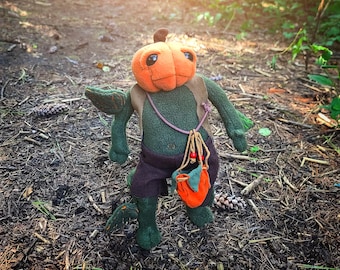 Sam the Pumpkin Head ooak handmade magical creature, with joints and soft plush. The perfect gift for someone who loves magic