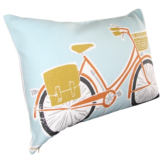 Scion Levande Cykel in Tangerine & Marine Cushion