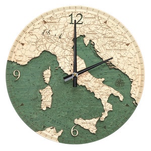 May include: A wooden clock with a map of Italy and the surrounding Mediterranean Sea. The clock face is green and brown with the numbers 12, 9, 6, and 3. The clock hands are black.
