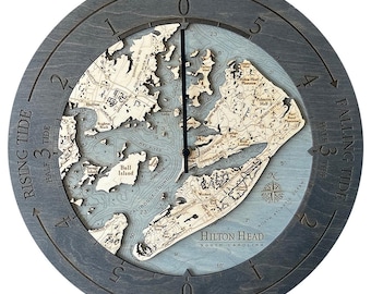 May include: A circular wooden tide clock featuring a bathymetric map of Hilton Head, South Carolina. The dark gray frame displays tide levels from zero to five, labeled High Tide, Falling Tide, Low Tide, and Rising Tide with a single black hand.