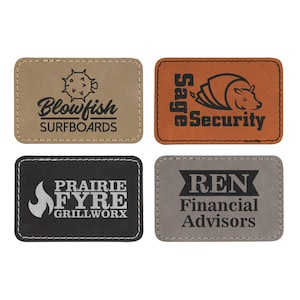 May include: Four different leather patches with stitched edges. The patches are in various colors, including brown, tan, gray, and black. Each patch features a different logo or text. The logos include a blowfish, a stylized armadillo, a flame, and a banner with the text "REN". The text on the patches includes "Blowfish Surfboards", "Sage Security", "Prairie Fyre Grillworx", and "REN Financial Advisors".